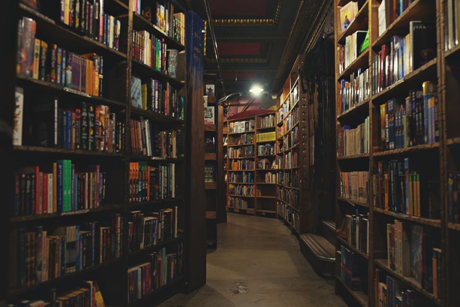 A collection of bestselling thriller novels prominently displayed in a bookstore setting.
